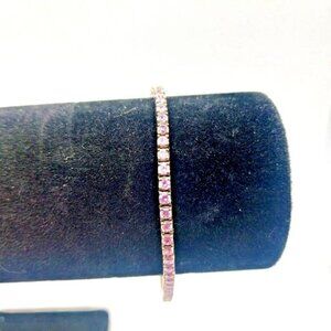 Pink CZ tennis bracelet Sterling Silver marked 925 and ADI 60 stones
